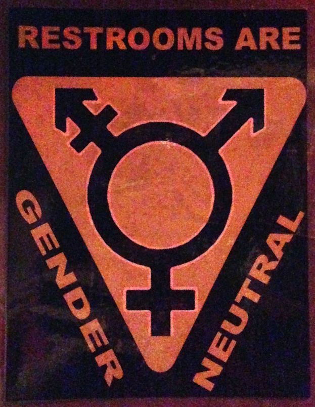 Plakat mit Text "Toiletten sind Geschlechterneutral" bewirbt genderneutrale Toiletten.