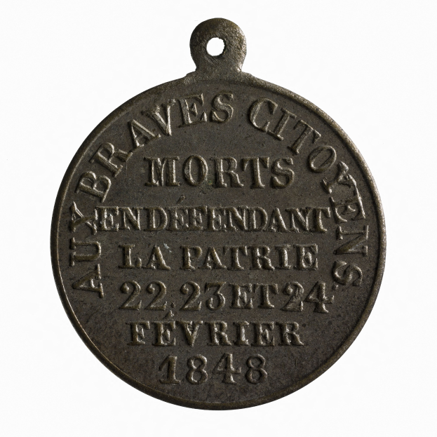 Bronze-Medaille mit 'Braves City Morts' eingraviert, vor einem weißen Hintergrund.