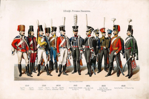 Eine Gruppe von Männern in 1836 deutschen Infanterieuniformen steht in einer Reihe, trägt Kappen und hält Gegenstände, mit '1836 Deutsche Infanterie' Text unten.